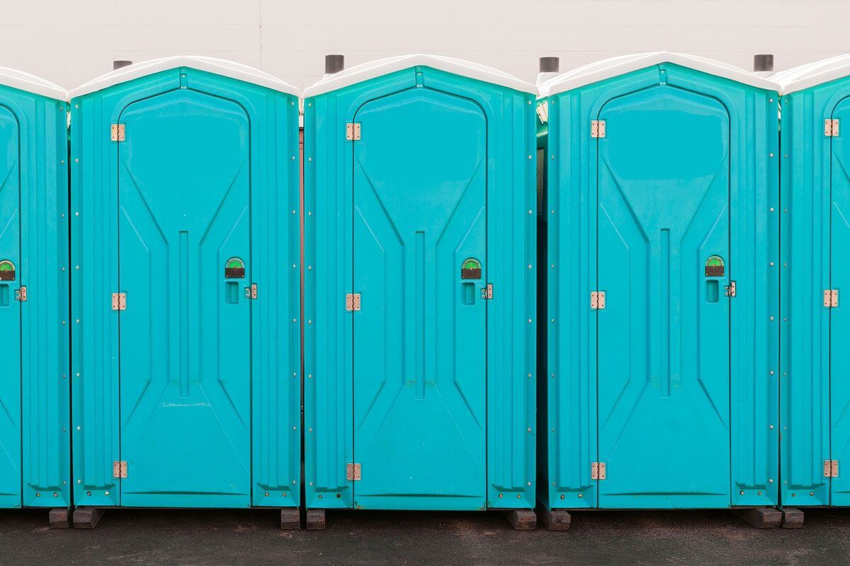 Industrial portable restroom units at a plant in Pittston, Pennsylvania